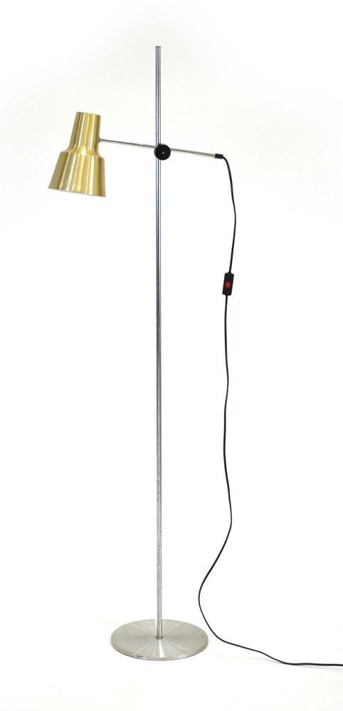 A 1970's brass coloured single spot standard lamp on an aluminium shaft CONDITION REPORT: