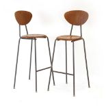 A pair of 1950/60's teak 'Dot'-style stools with matching back rests on tubular legs