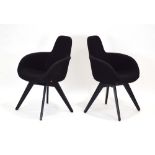 A pair of Tom Dixon black fabric highback 'Scoop' armchairs on ebonised legs