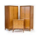 A 1950's Storys of Kensington cherry and Australian blackbean bedroom suite including a pair of two