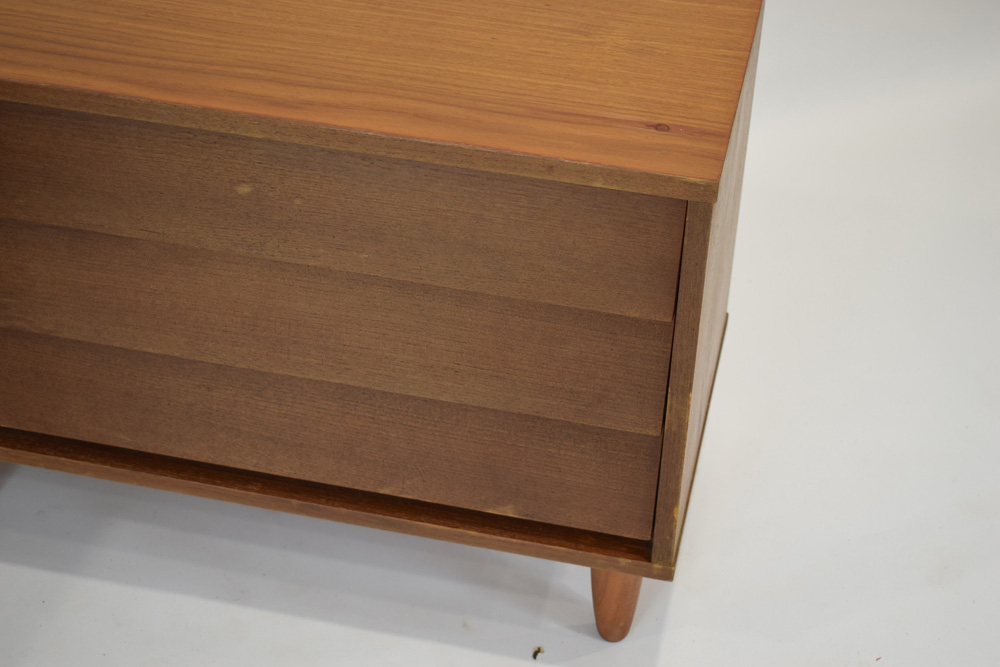 A pair of 1970's teak three-drawer chests, on later circular legs, w. - Image 4 of 4