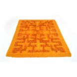 A 1970's orange woolen rya rug,