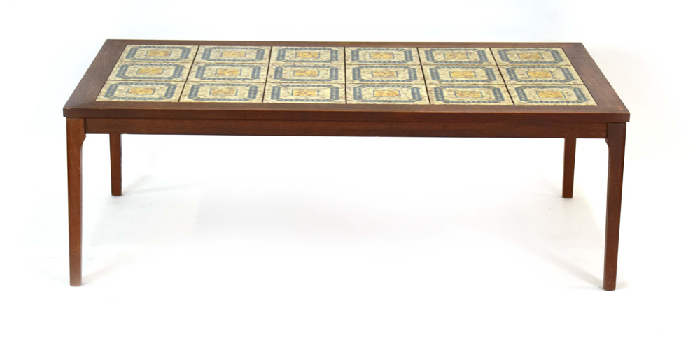 A 1970's teak coffee table, the surface inset with eighteen matching tiles,