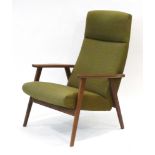 A 1960's Danish teak framed lounge armchair with green upholstery