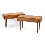 A pair of 1970's teak single-drawer side tables on tapering legs, w.