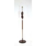 A 1950/60's walnut and copper finished standard lamp