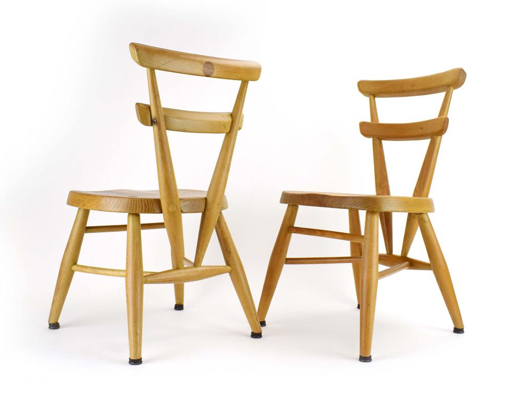 A pair of Ercol 'Red Dot' childrens stacking chairs in elm and beech, - Image 2 of 5