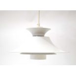 A 1970's Danish white enamelled ceiling light with a red inner filter in the manner of Louis