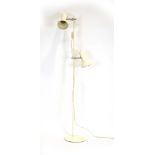 A 1970's white enamelled twin spot standard lamp CONDITION REPORT: Leads cut,