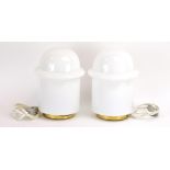 A pair of 1970's Czech brass and opaline glass lamps, h.