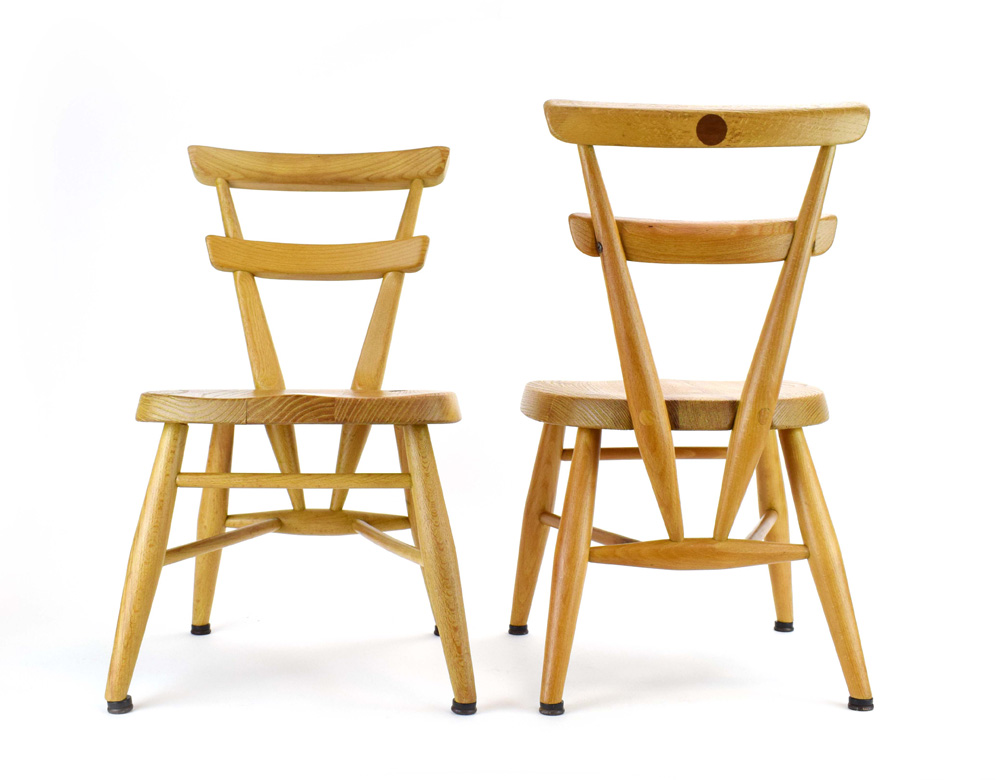A pair of Ercol 'Red Dot' childrens stacking chairs in elm and beech, - Image 4 of 5