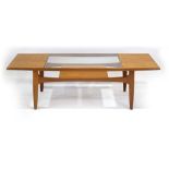 A G-Plan Fresco Range teak and crossbanded occasional table with a glazed insert, l.