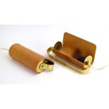 A pair of Swedish bent ply and brass finished wall lights with adjustable shades