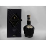 A bottle of Royal Salute 21 year old Signature Blend Scotch Whisky by Chivas Brothers in Sapphire