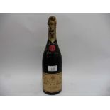 An old bottle of Moet & Chandon 1941 Dry Imperial Extra Quality Champagne (ullage low shoulder)