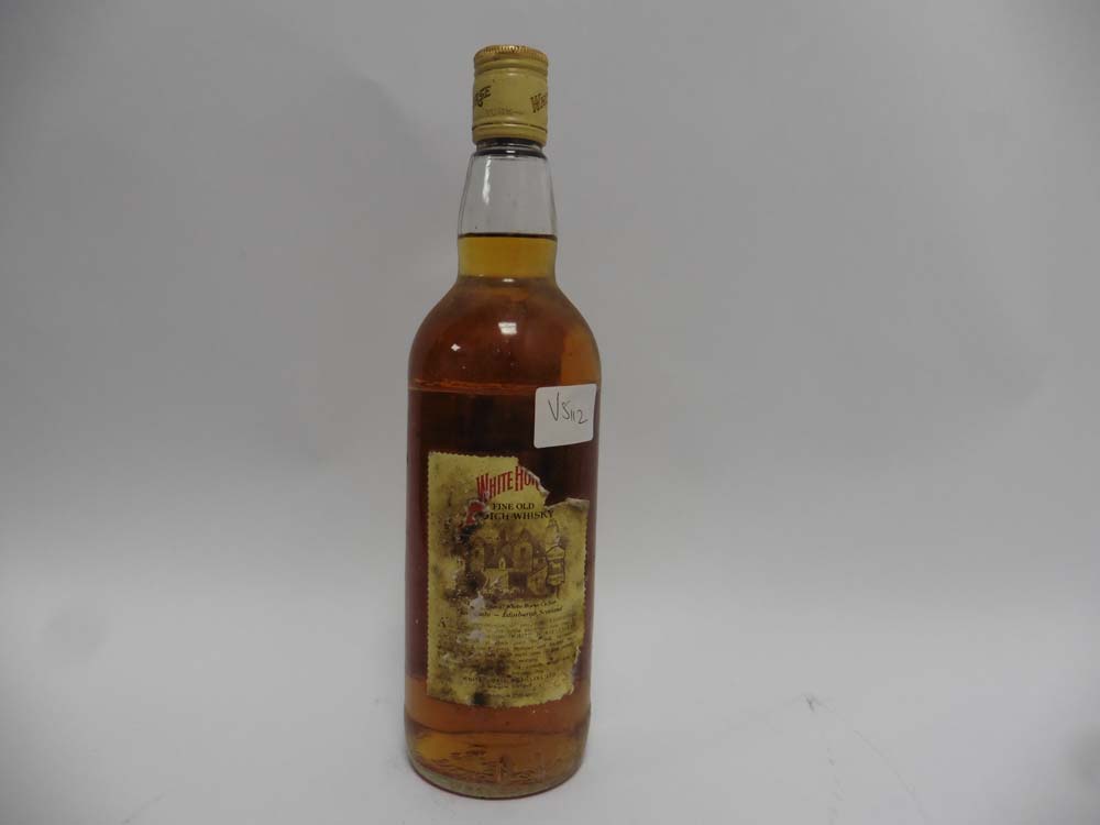 An old bottle of White Horse Fine Old Whisky circa 1970's 70proof 26 2/3 fl oz 75. - Image 2 of 2
