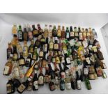 A collection of approximately 80 assorted miniatures