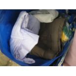 Crate of various fabric and linen