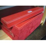 Graduated set of red storage boxes