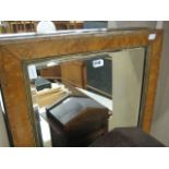 Rectangular framed and bevelled wall mirror