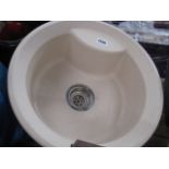 Circular kitchen sink in beige