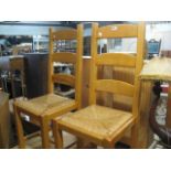 Pair of wicker seated dining chairs