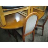 Oval extending dining table with 4 matching chairs