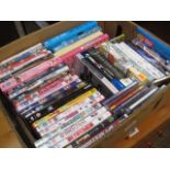 Box containing books and DVDs