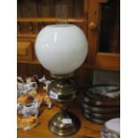 Brass oil lamp with white shade