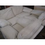 Beige upholstered lounge suite comprising 2 large 2 seater sofas