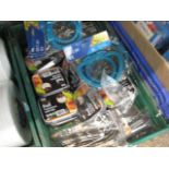 Crate of takeaway containers, plastic cutlery and fruit slicers