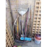Selection of garden tools incl. rakes, scythes, forks, spades, etc.