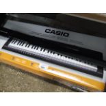 Casio digital keyboard with stand