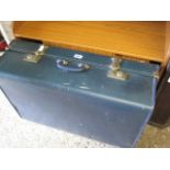 Blue vinyl suitcase