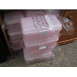 Quantity of pink plastic lunch boxes