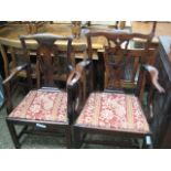 His & Hers pair of mahogany dining chairs (collectors item)