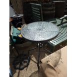 Circular glass top garden table