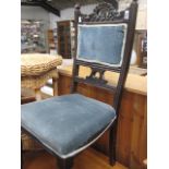 Blue upholstered bedroom chair (collectors item)