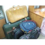 4 various sized suitcases and 2 rucksacks