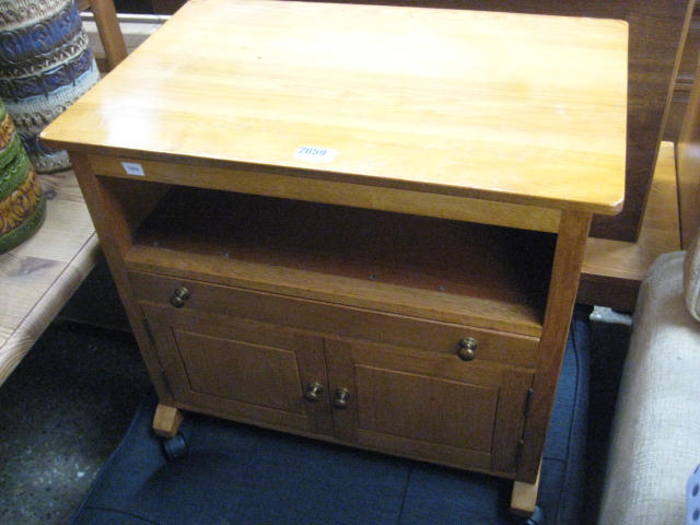 Light oak storage unit on castors