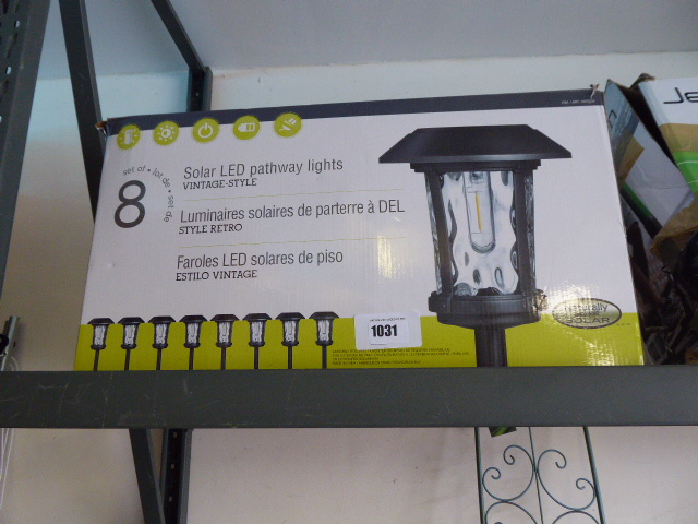 Box containing set of 8 solar LED parkway lights