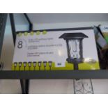 Box containing set of 8 solar LED parkway lights