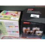 Box containing Bodum Pavina thermo glasses and boxed acrylic tumbler set