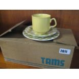 Boxed set of Tams cups, saucers, and plates