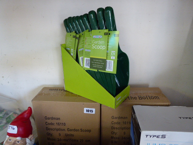 2 boxes containing garden plastic scoops