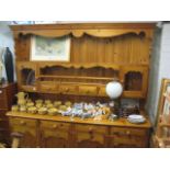 Large pine dresser with 4 cupboards below