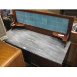 Marble top wash stand with tiled back on castors