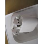 Boxed pair of Apple air pods with charging case