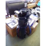 Head golf bag in blue, black and red containing mixed branded golf clubs