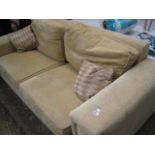 Beige upholstered large 2 seater sofa